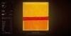 Abstract schilderij van Mark Rothko met grote kleurvlakken in geel, oranje en een smalle rode band in het midden