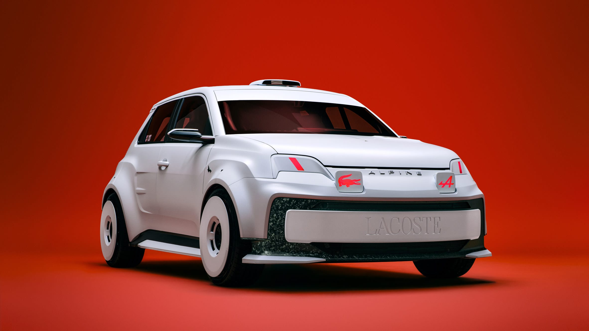 Witte Alpine A290_β conceptauto met Lacoste-branding tegen een felrode achtergrond